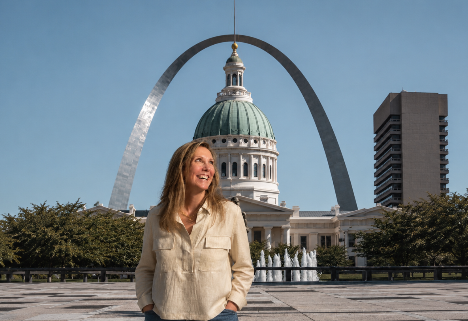 Elizabeth Sparks-Holmes in St. Louis with the Gateway Arch in the background.